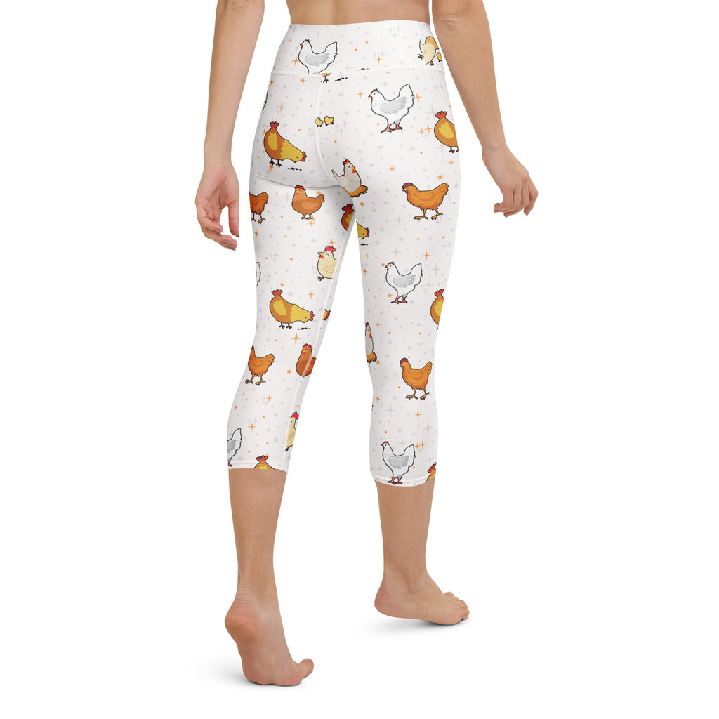 White high-rise capri leggings with orange white and yellow cartoon chickens soft stretch moisture-wicking fabric