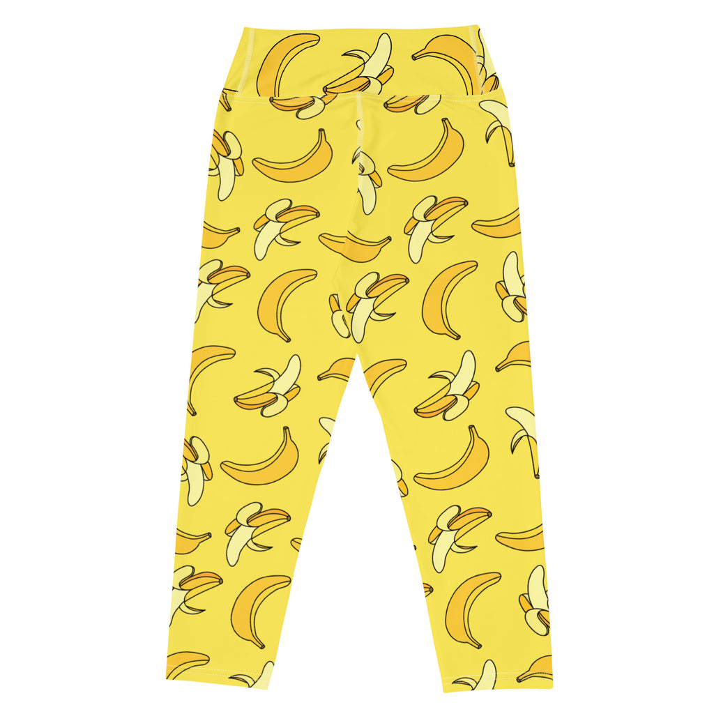 Women’s yellow high-rise banana buttery soft yoga capri leggings with playful cartoon banana pattern and moisture-wicking fabric