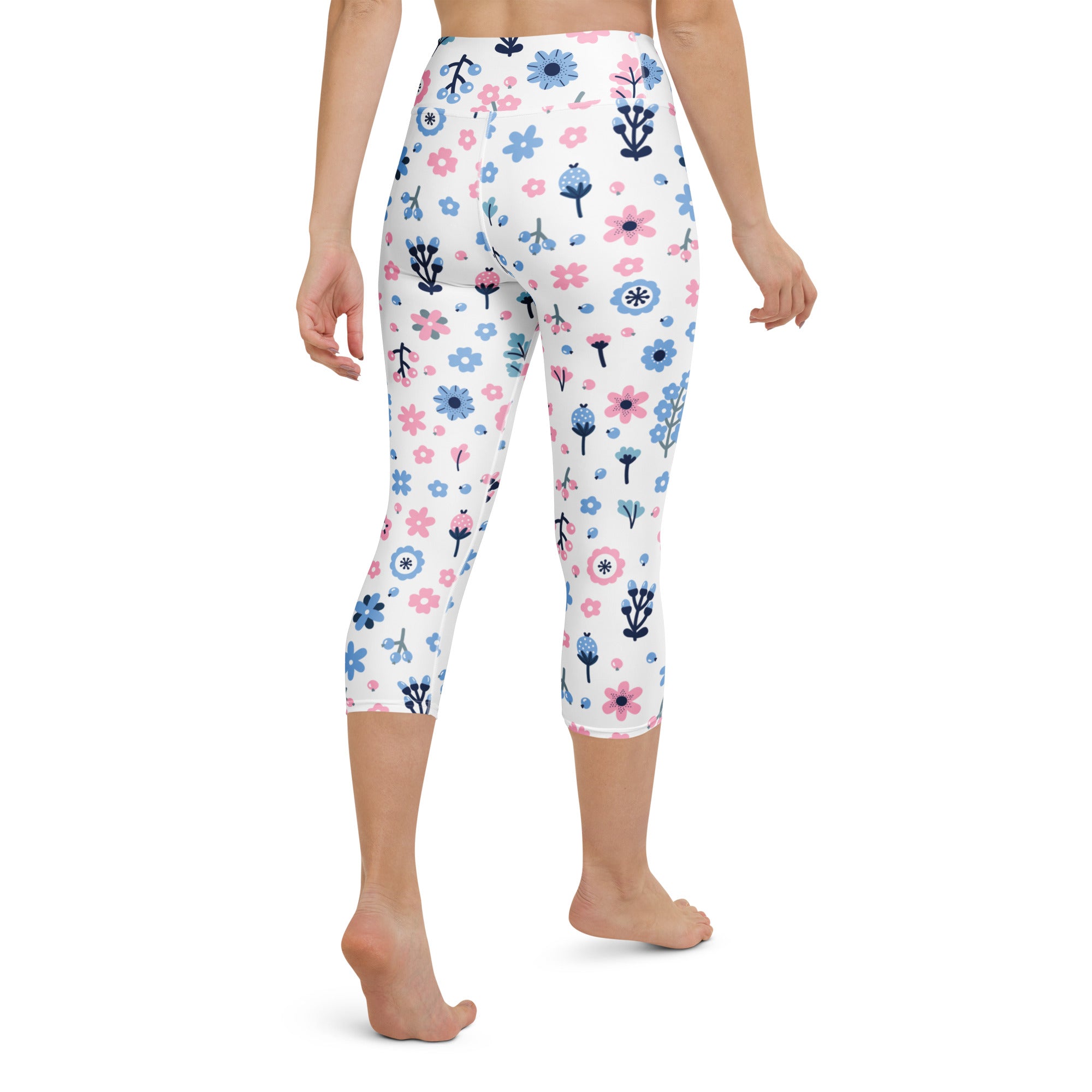 White capri leggings with pastel pink and blue floral pattern high-rise buttery soft moisture-wicking yoga pants