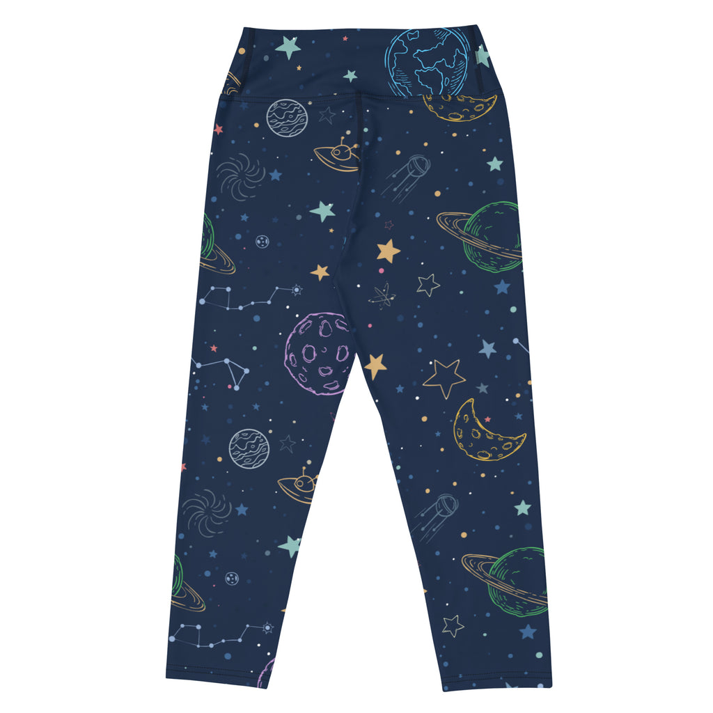 Women’s dark blue space-themed high-rise buttery soft yoga capri leggings with colorful planets and moisture-wicking fabric