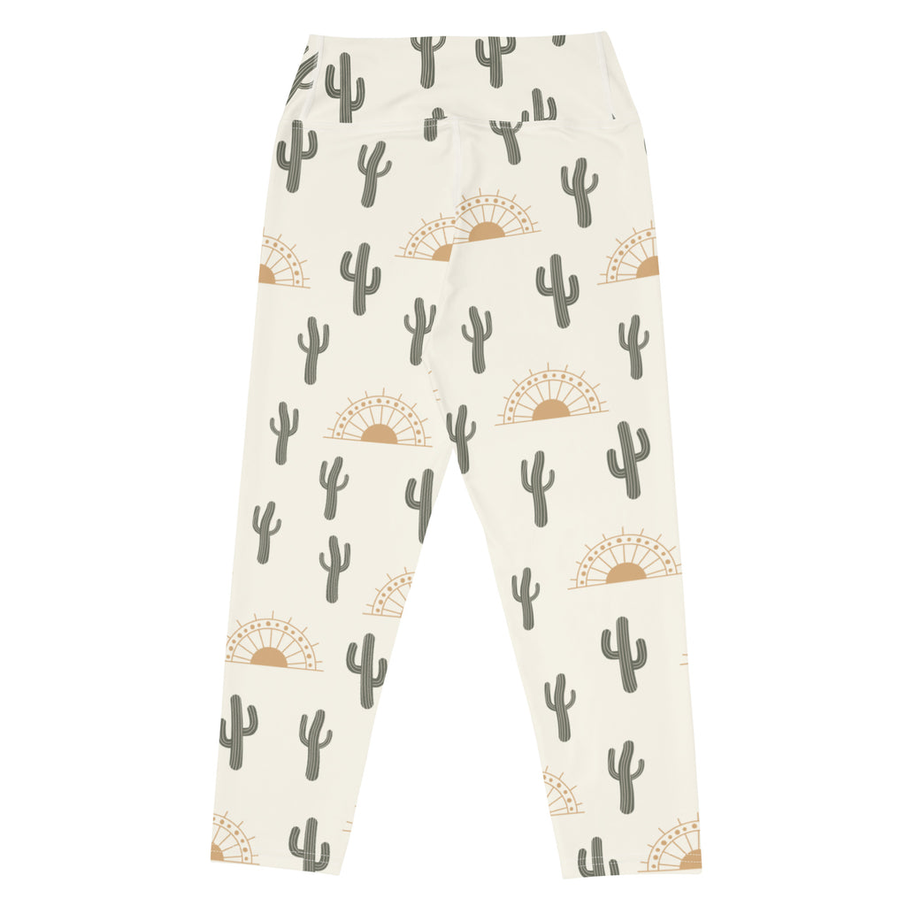 Women’s cream-colored high-rise buttery soft yoga capri leggings with gray cactus and tan sunburst pattern