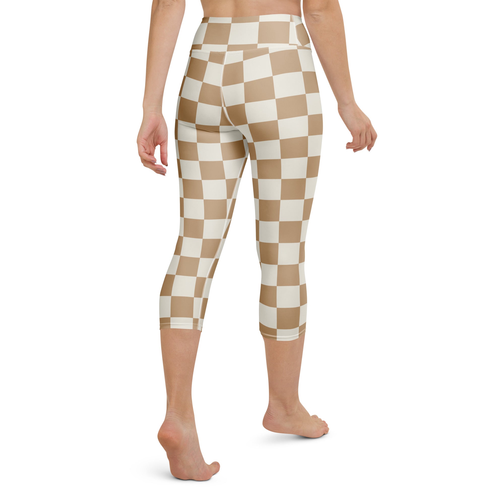 Women’s beige and white checkered high-rise buttery soft yoga capri leggings with moisture-wicking stretch fabric