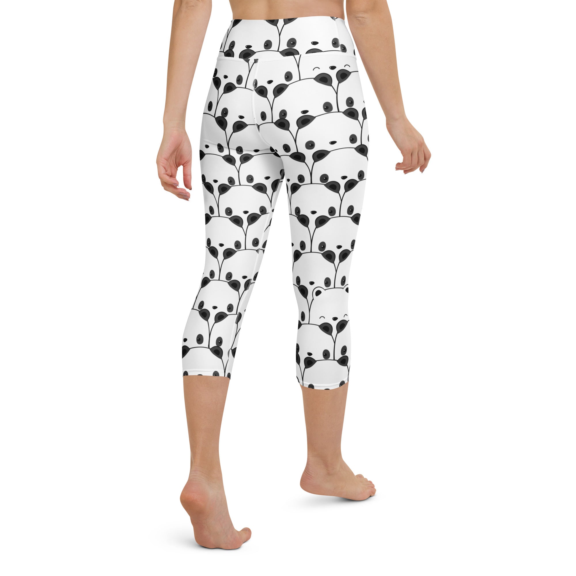 White capri leggings with playful black panda face pattern high-rise buttery soft moisture-wicking yoga pants