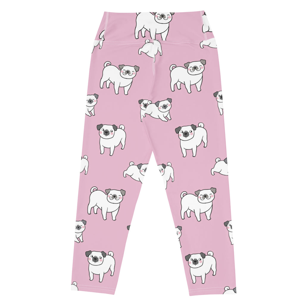 Women’s pink buttery soft high-rise yoga capri leggings with playful white pug pattern and moisture-wicking stretch