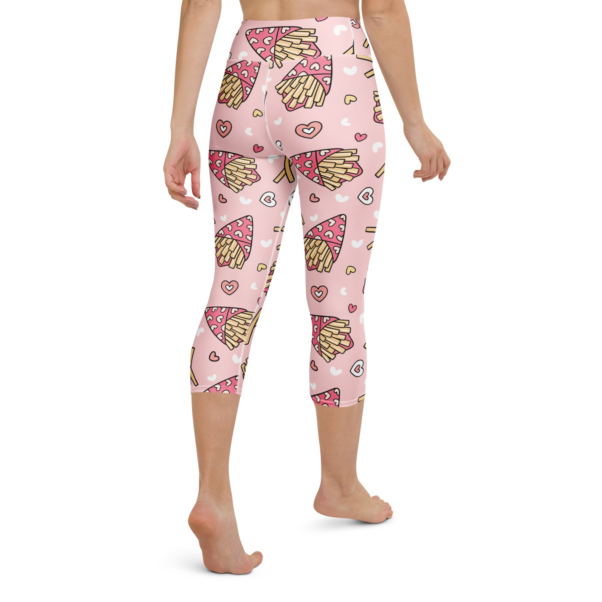 Women’s pink high-rise buttery soft capri leggings with cartoon french fries and hearts pattern for yoga and activewear