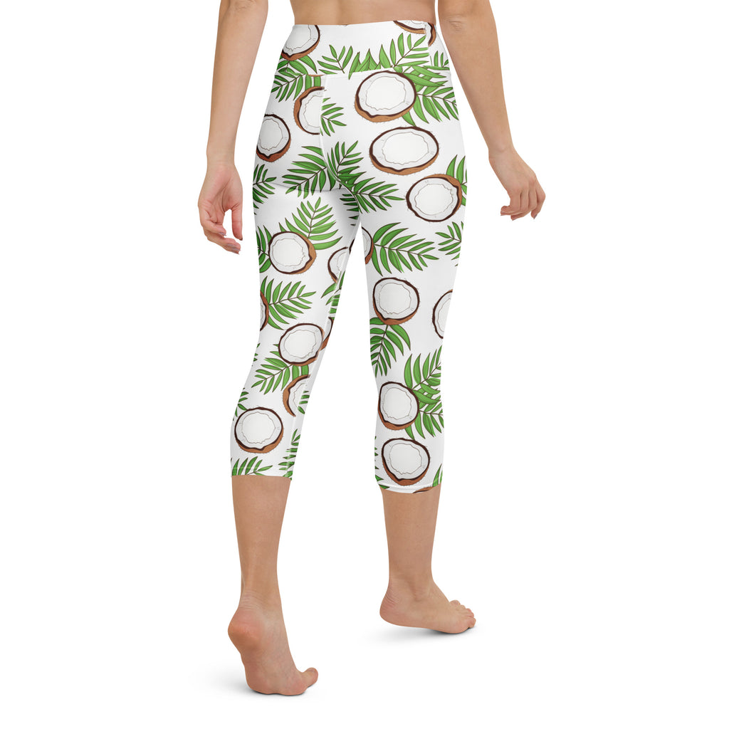 White high-rise capri leggings with green palm leaves and halved coconut pattern soft stretch moisture-wicking activewear