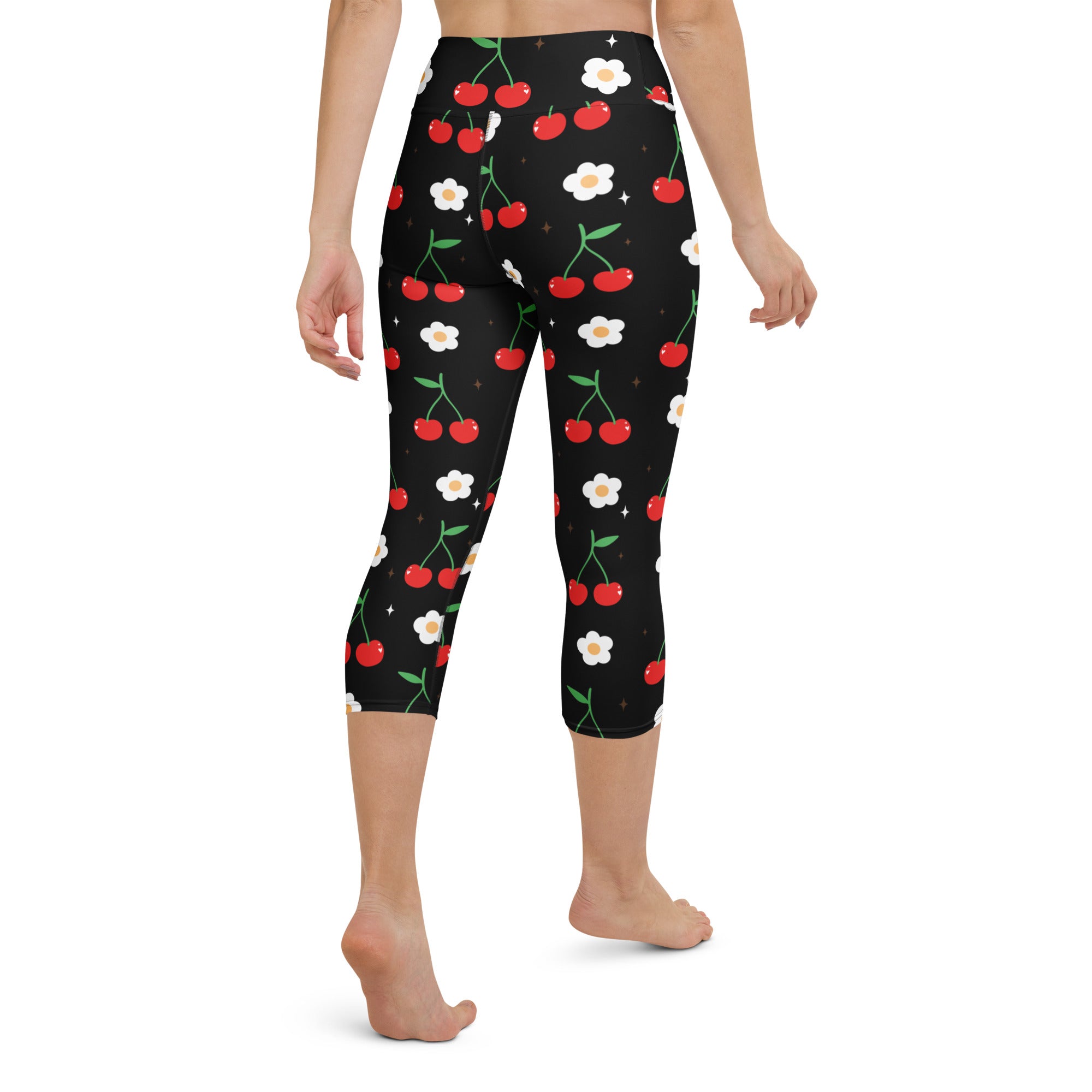 Women’s black cherry blossom buttery soft high-rise capri leggings with red cherries white daisies and green stems pattern