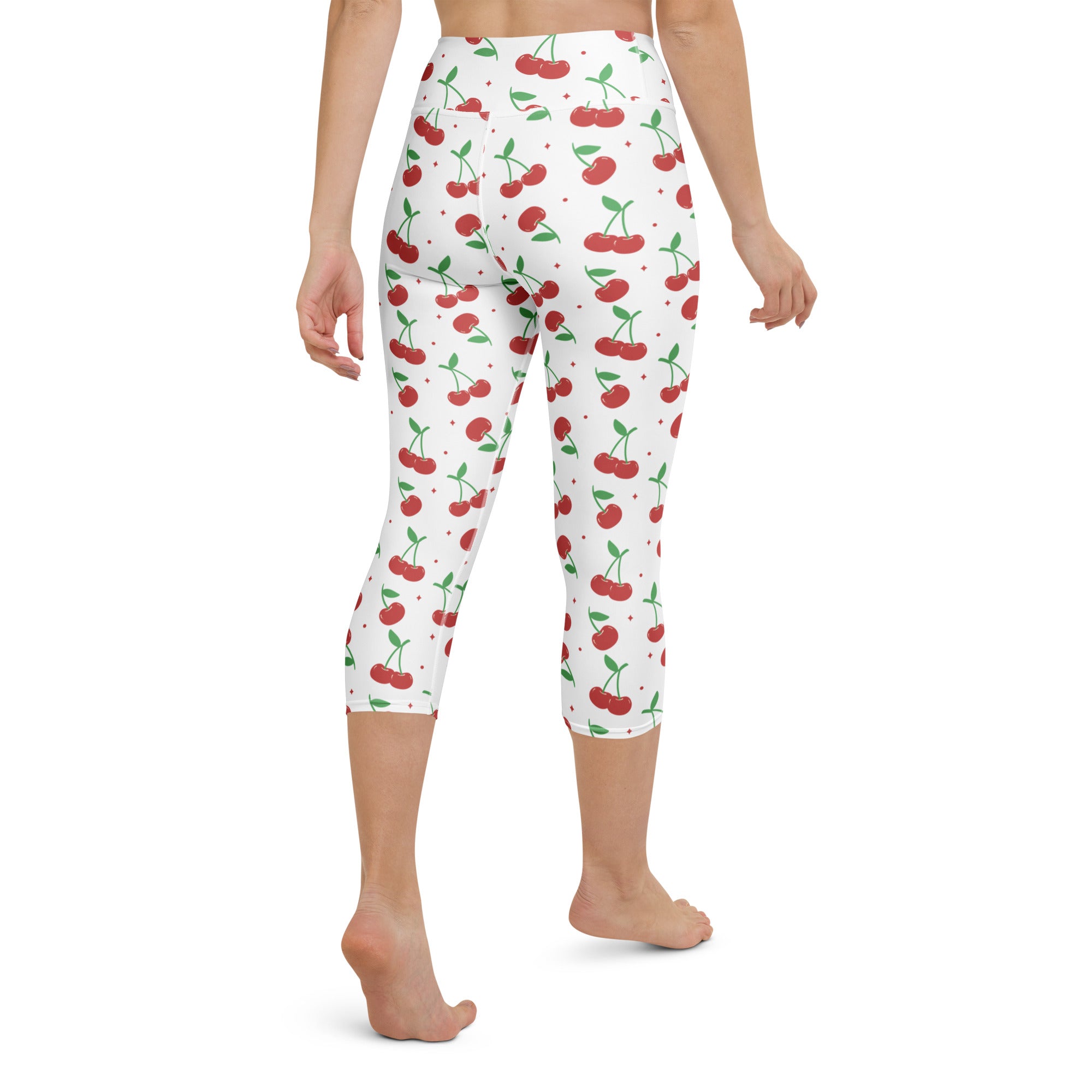 Women’s white high-rise butter soft yoga capri leggings with red cherry print and moisture-wicking stretch fabric