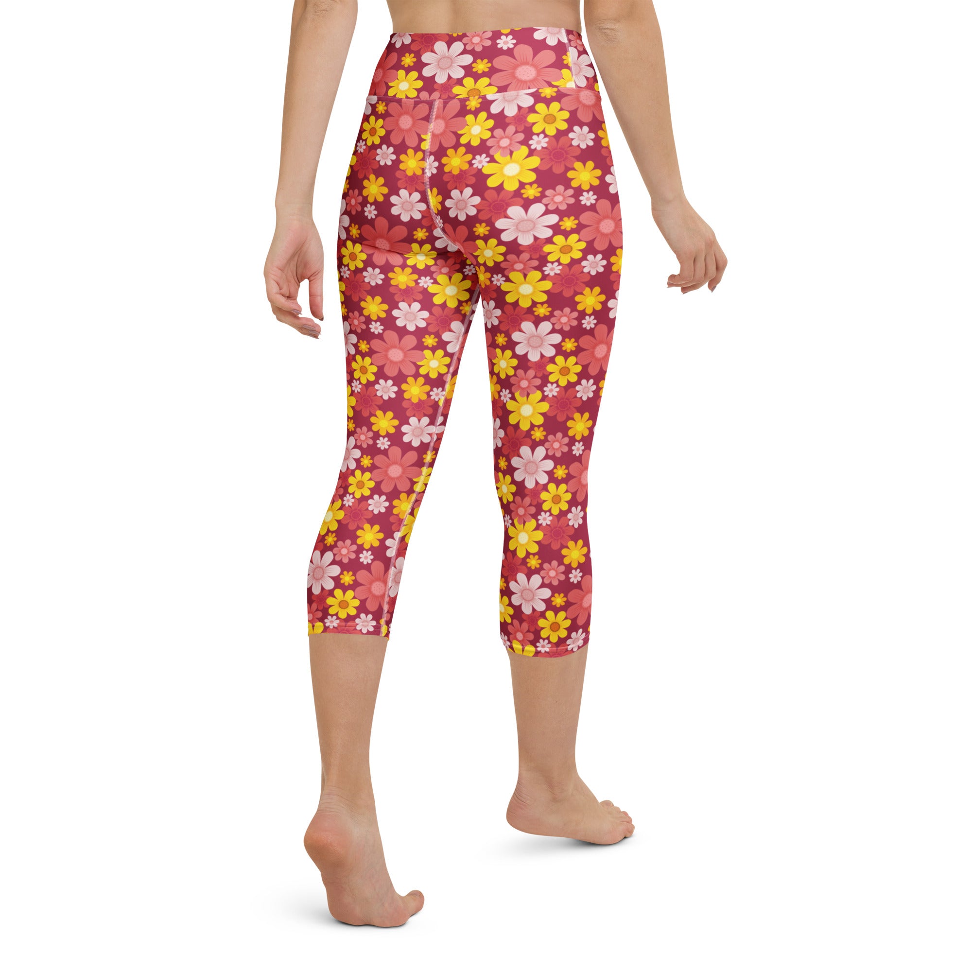 Women’s high-rise buttery soft pink and yellow floral patterned yoga capri leggings with moisture-wicking stretch