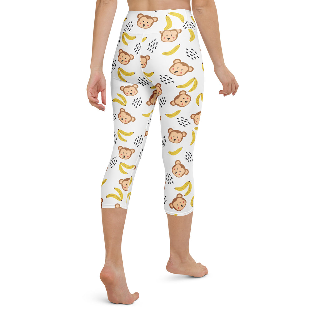 White high-rise capri yoga leggings with brown monkey banana pattern moisture-wicking buttery soft stretch