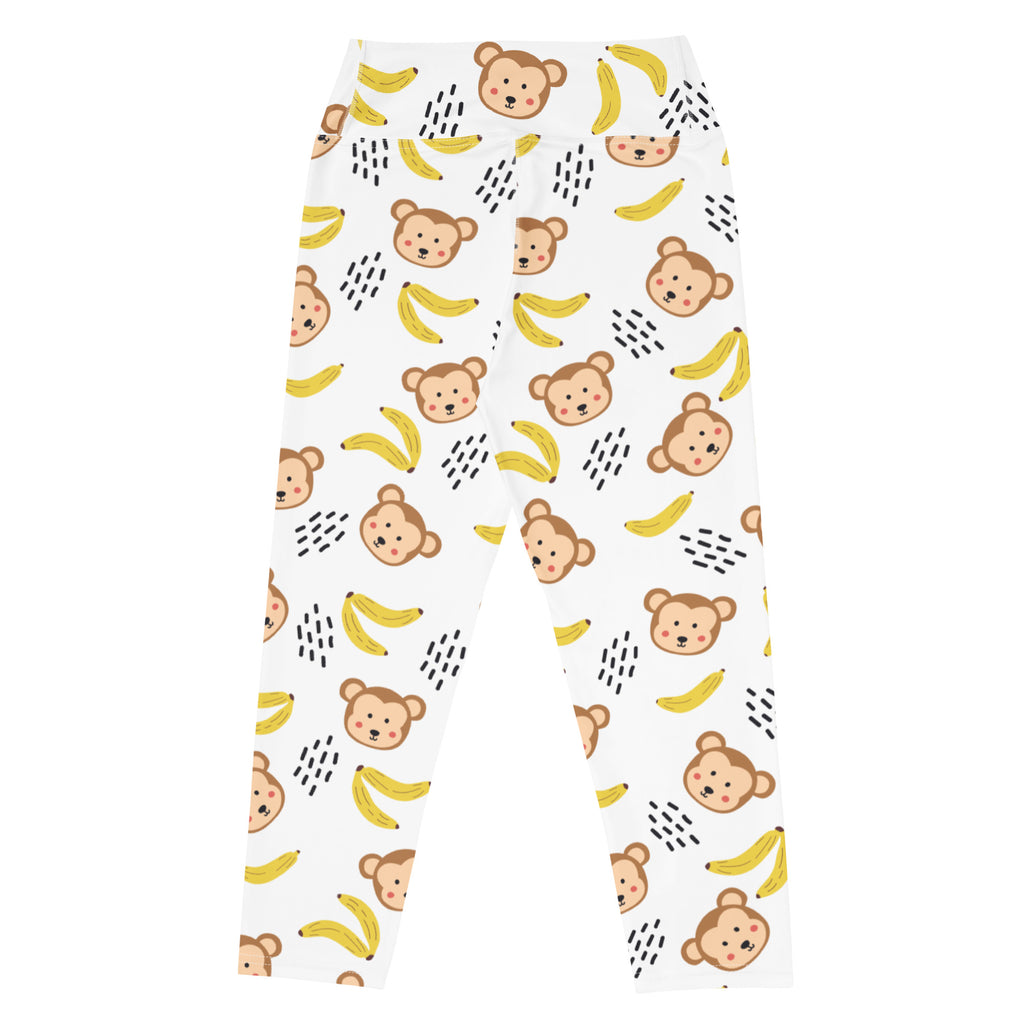 White womens high-rise monkey buttery soft yoga capri leggings with brown and yellow cartoon monkey and banana pattern