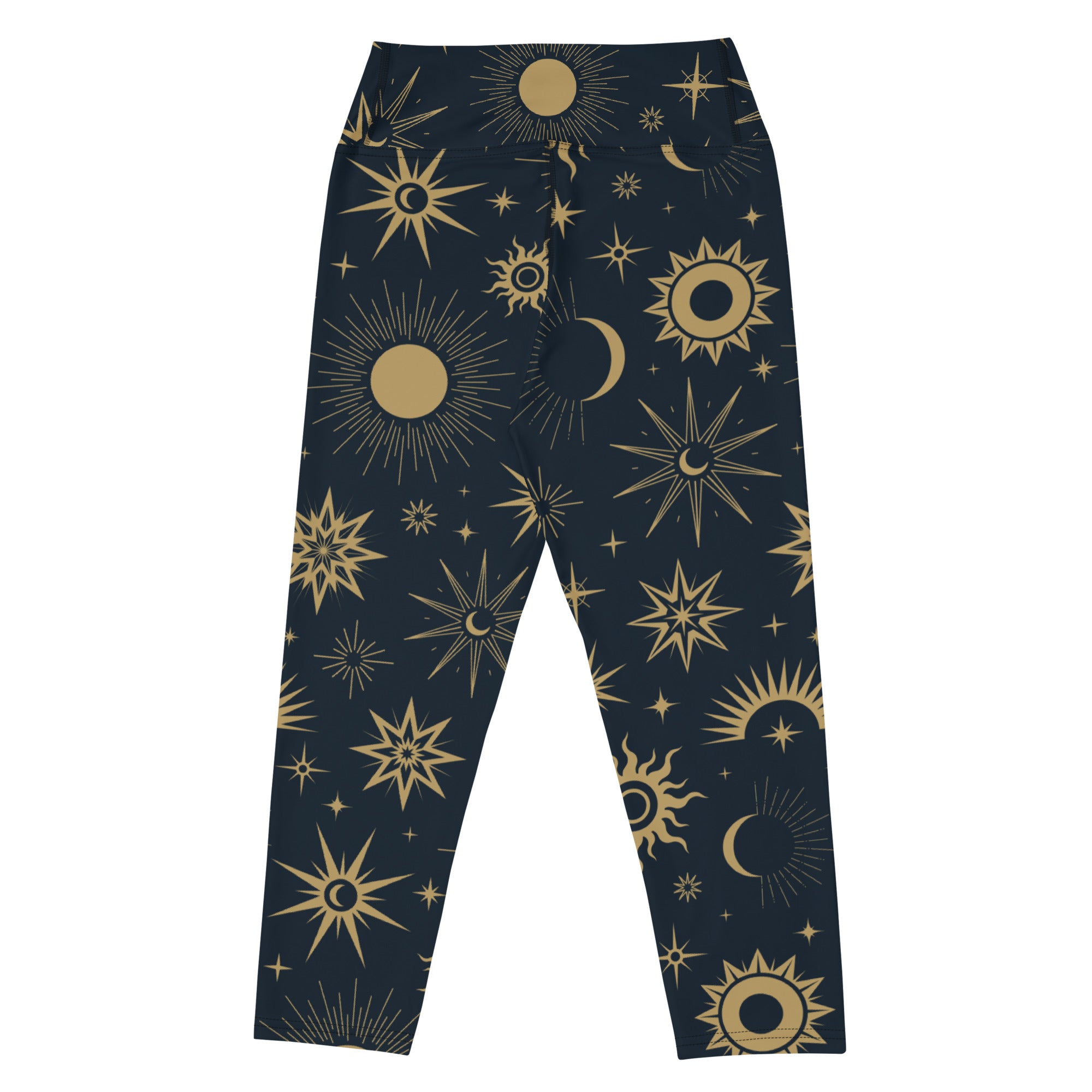 Dark blue high-rise womens yoga capri leggings with gold celestial sun moon stars pattern butter soft fabric