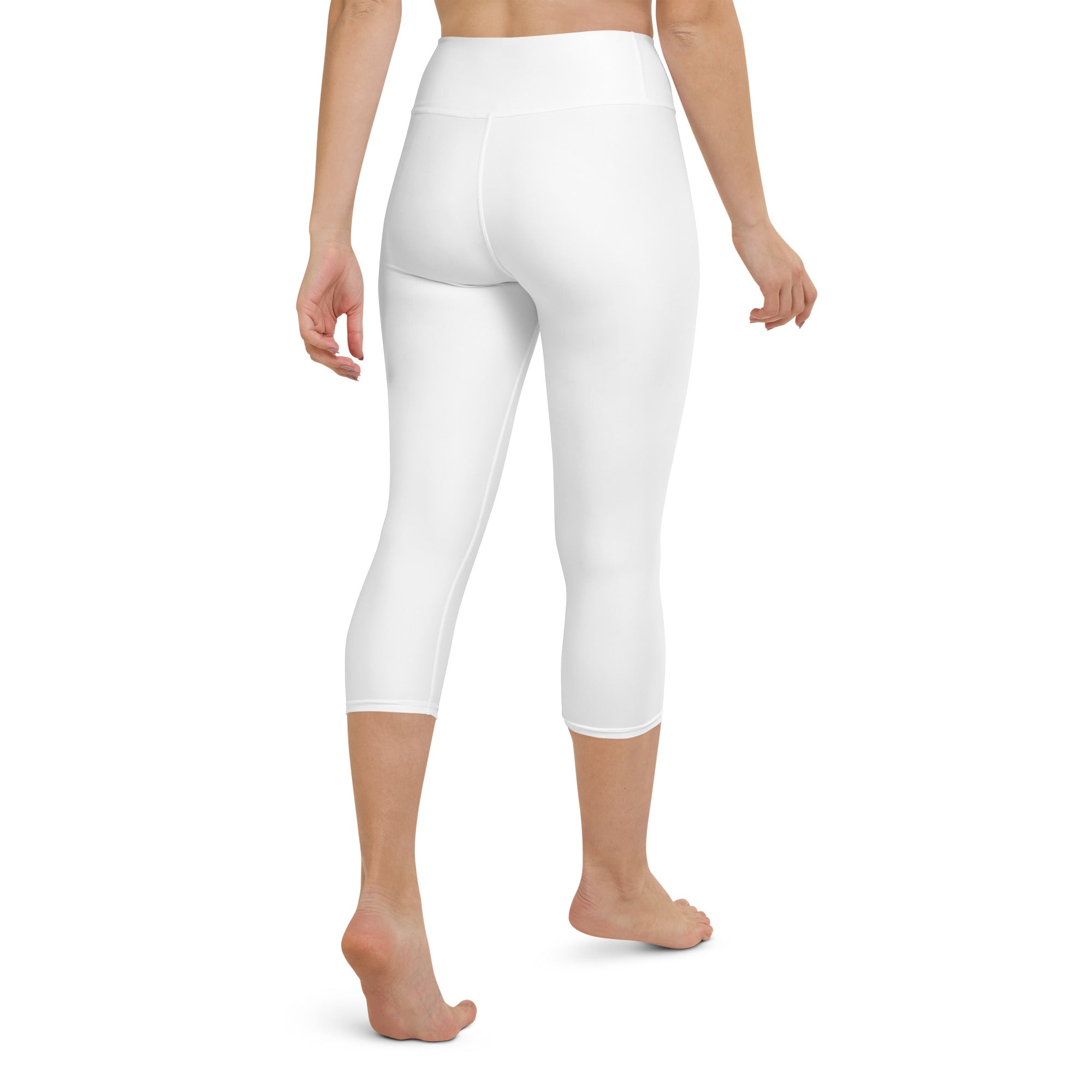 White high-waisted capri leggings made from smooth stretchy buttery soft fabric ideal for yoga and activewear