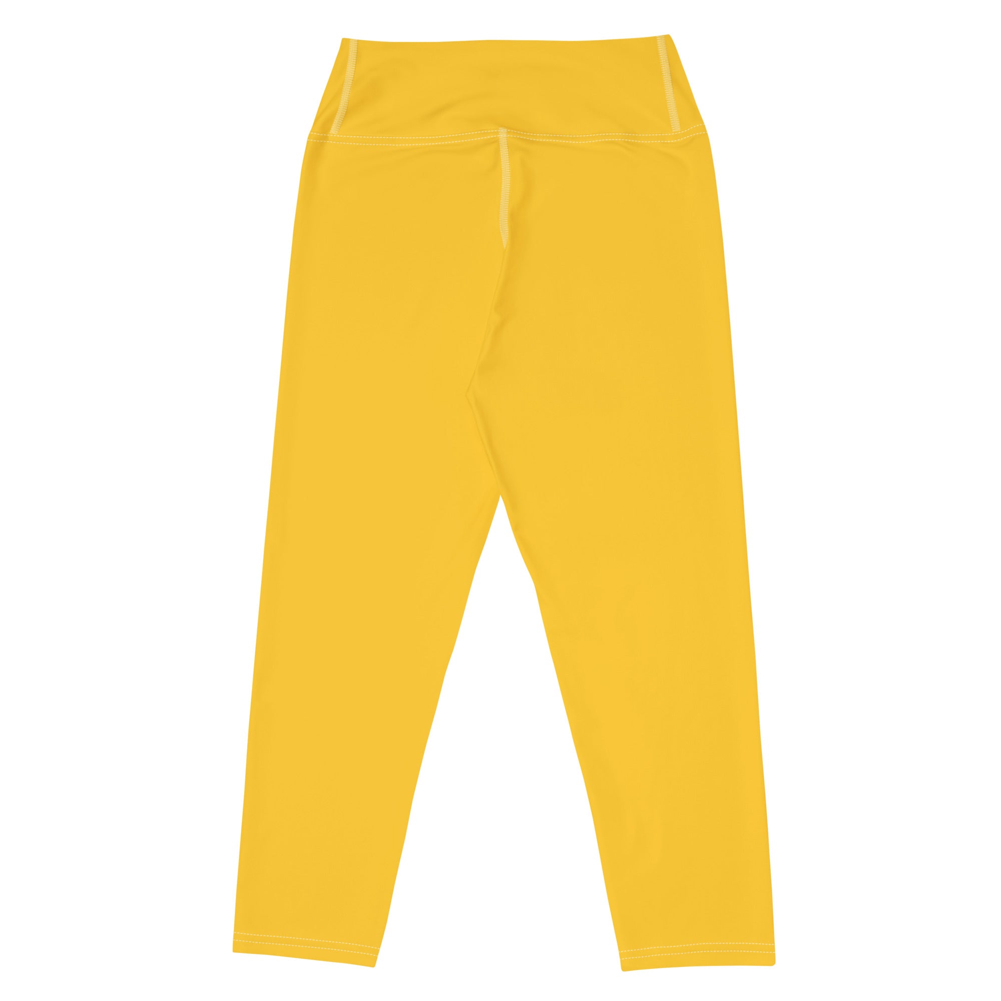 Bright yellow high-rise buttery soft yoga capri leggings made of stretchy moisture-wicking fabric for activewear