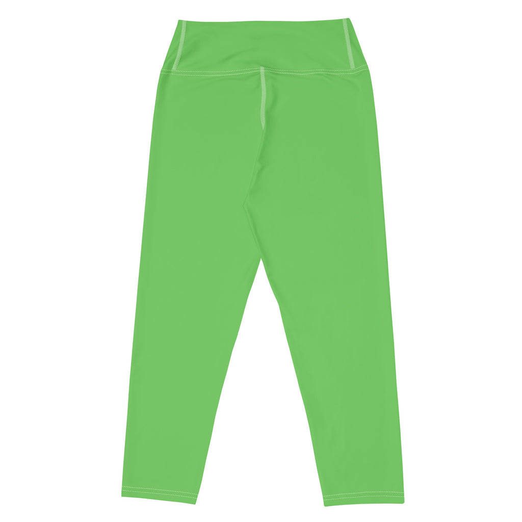 Women’s green high-rise buttery soft yoga capri leggings with moisture-wicking smooth stretchy fabric and white stitching