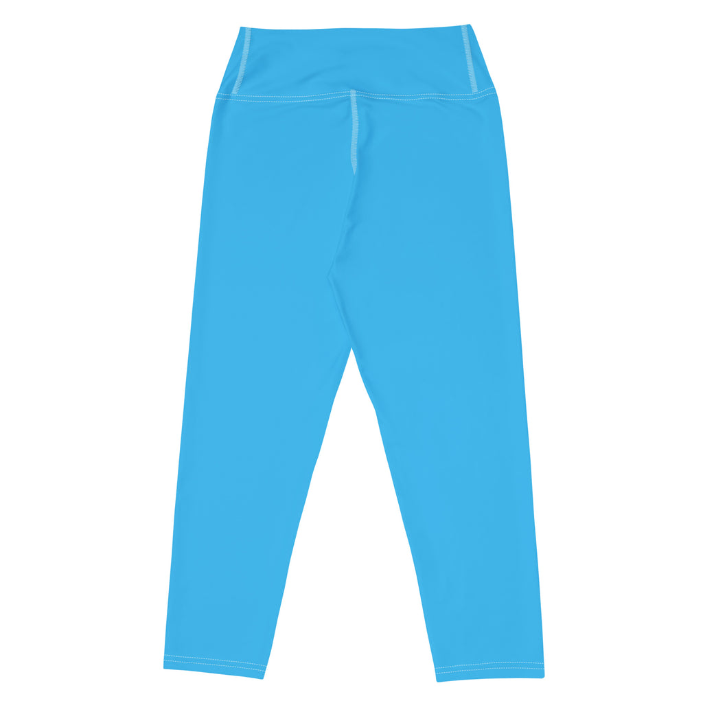 Women’s sky blue high-waisted buttery soft yoga capri leggings with white stitching, moisture-wicking and stretch fabric
