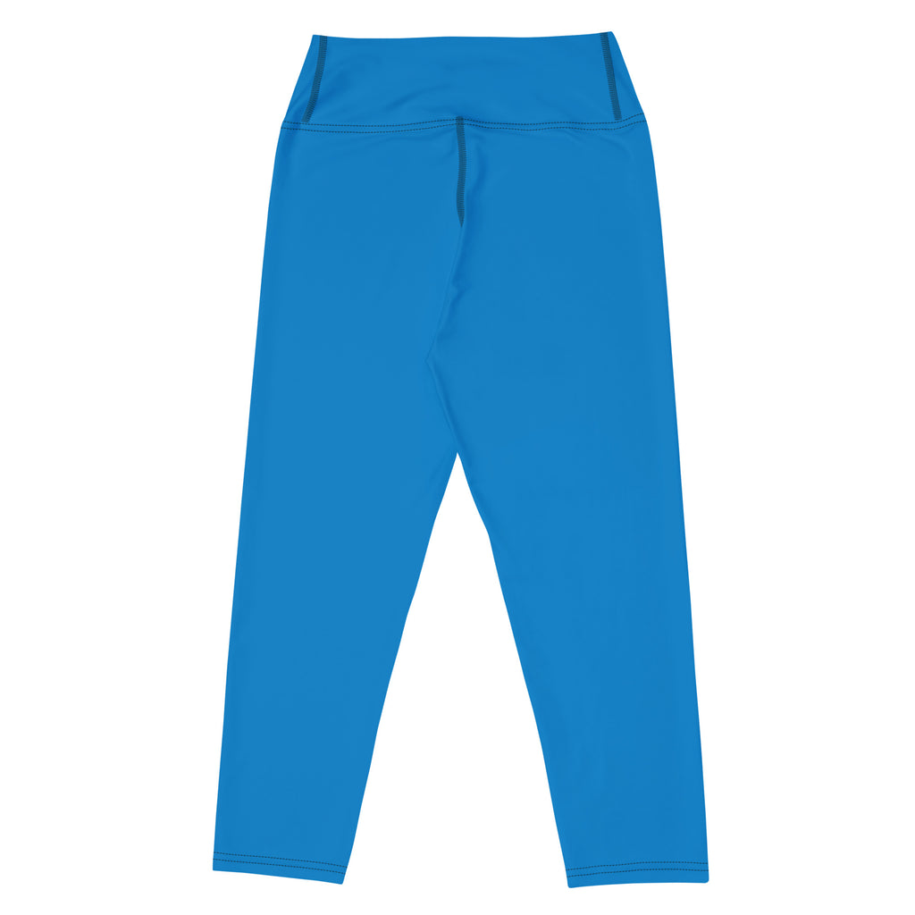 Women’s royal blue buttery soft high-rise yoga capri leggings made of stretchy moisture-wicking fabric