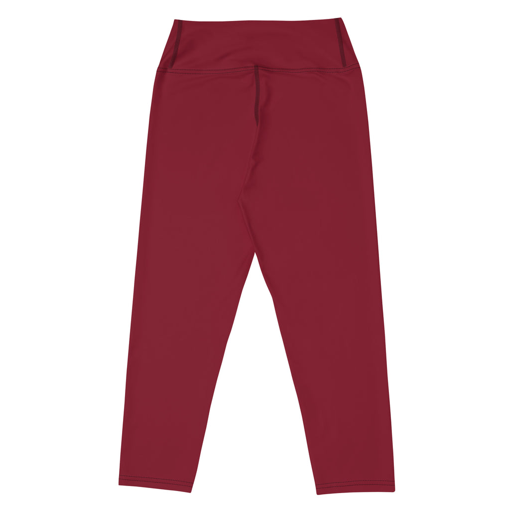 Women’s burgundy high-rise yoga capri leggings made of buttery soft moisture-wicking stretchy fabric