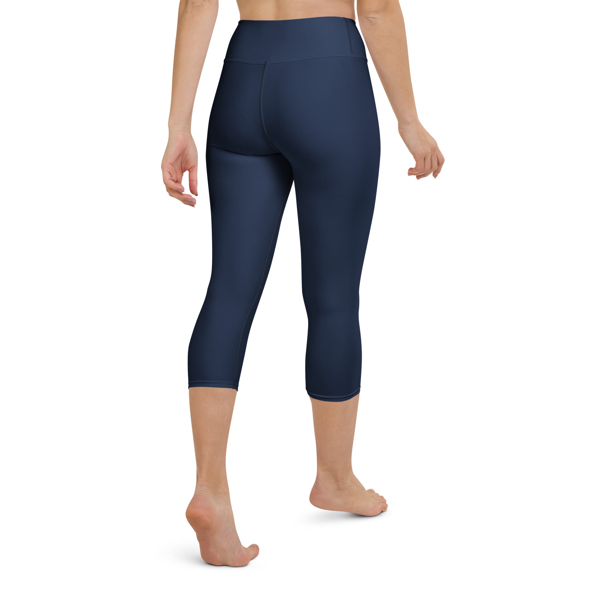Women’s navy buttery soft high-rise capri leggings with moisture-wicking soft stretch fabric for yoga and activewear
