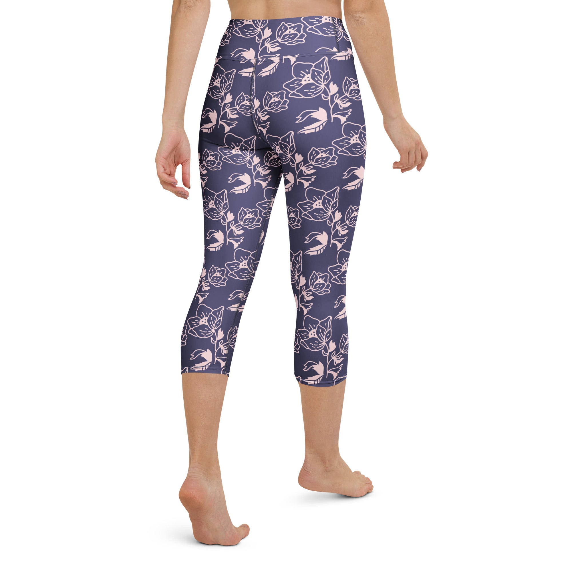 Women’s purple floral buttery soft high-rise yoga capri leggings with delicate white and pink botanical designs