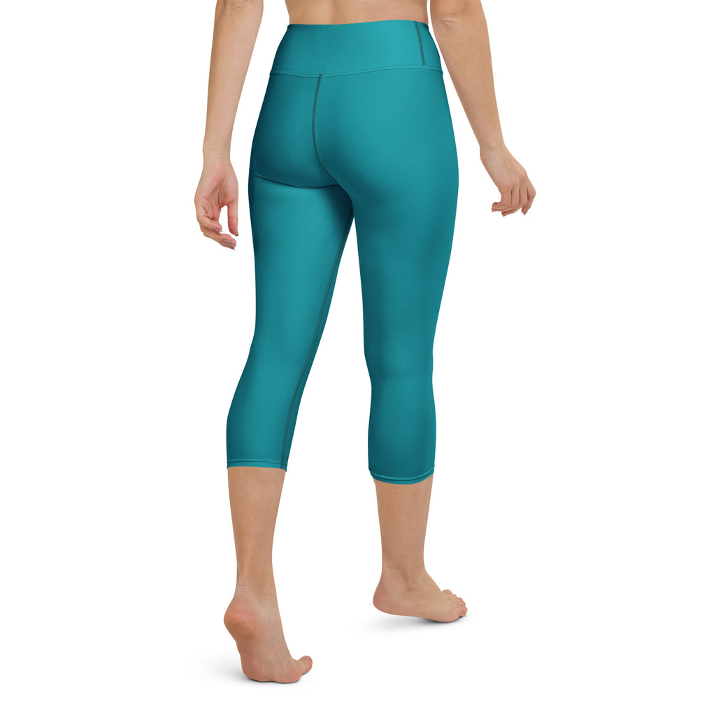 Women’s teal high-rise buttery soft yoga capri leggings made of moisture-wicking soft stretch fabric