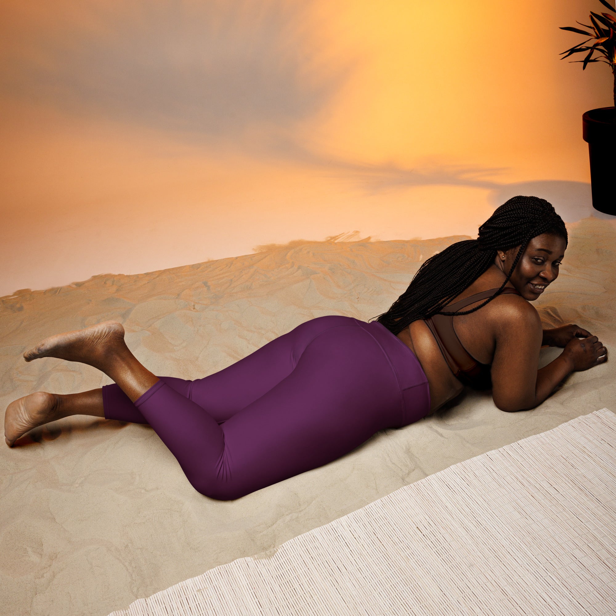 Women’s plum purple high-rise buttery soft yoga capri leggings with moisture-wicking soft stretch fabric