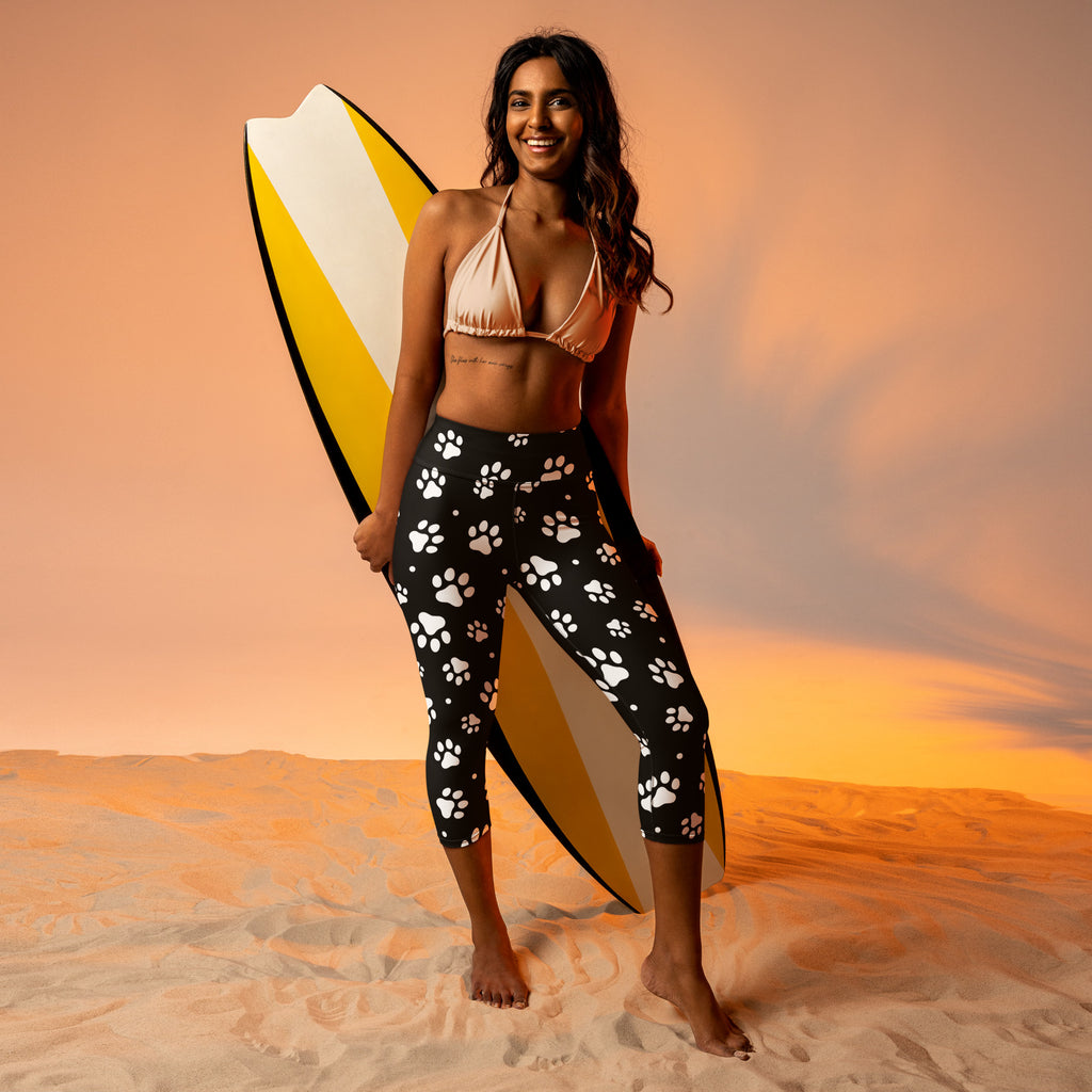 Women’s high-rise black paw print yoga capri leggings with buttery soft moisture-wicking stretch fabric