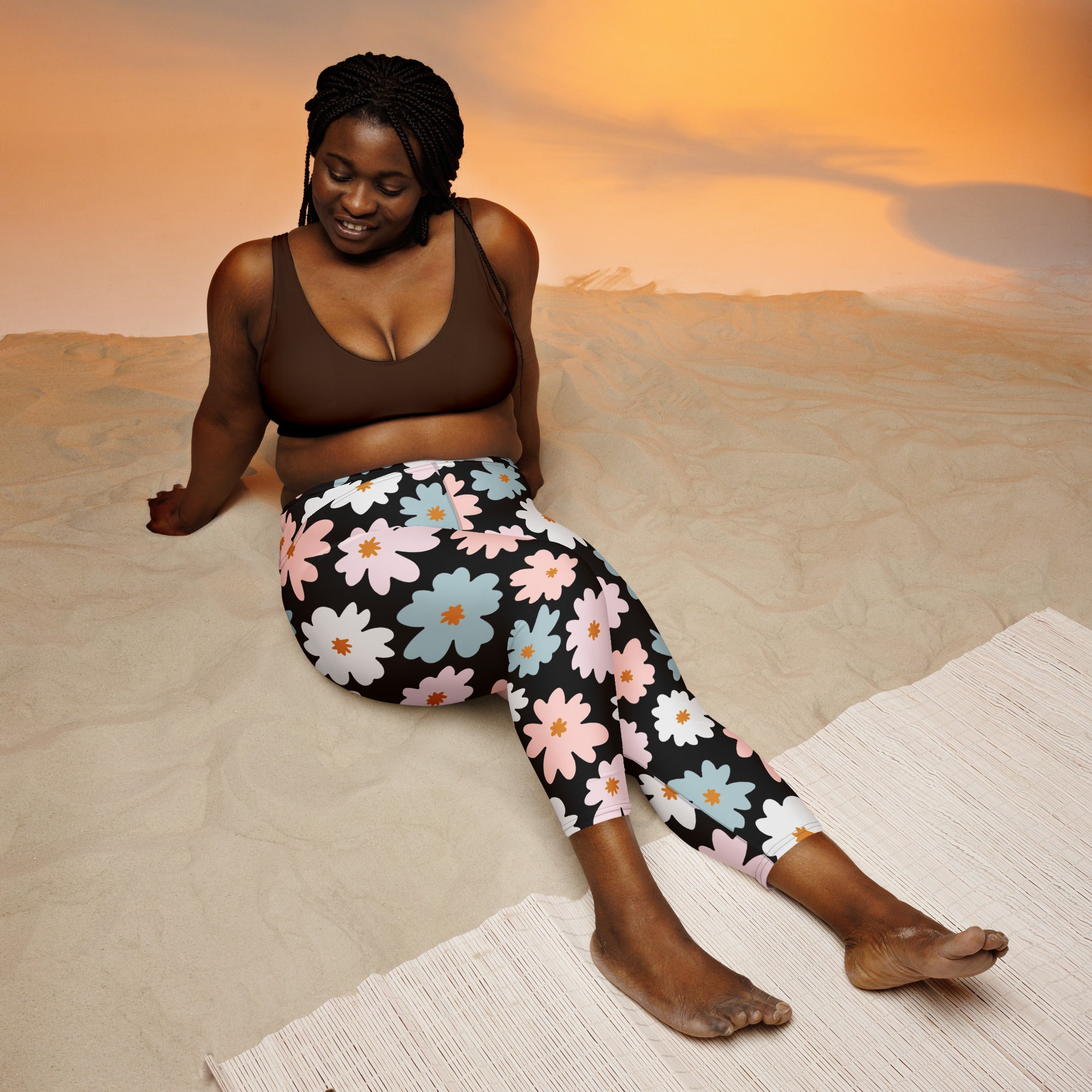 Women’s retro floral buttery soft black yoga capri leggings with pink white and blue daisies and high-rise fit