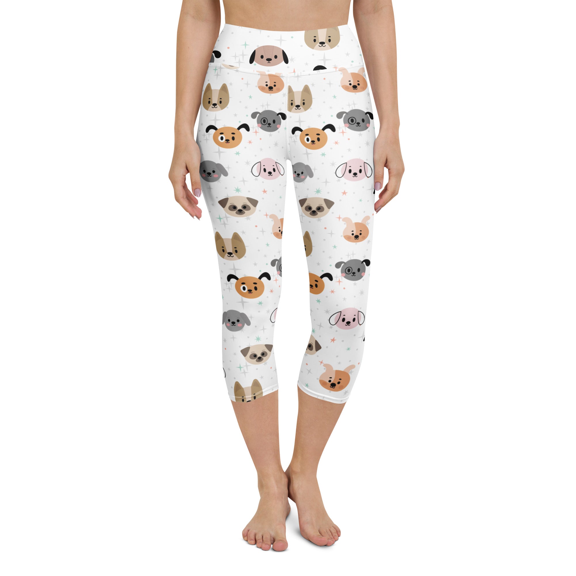 White high-rise buttery soft yoga capri leggings with colorful cartoon dog faces moisture-wicking stretch fabric