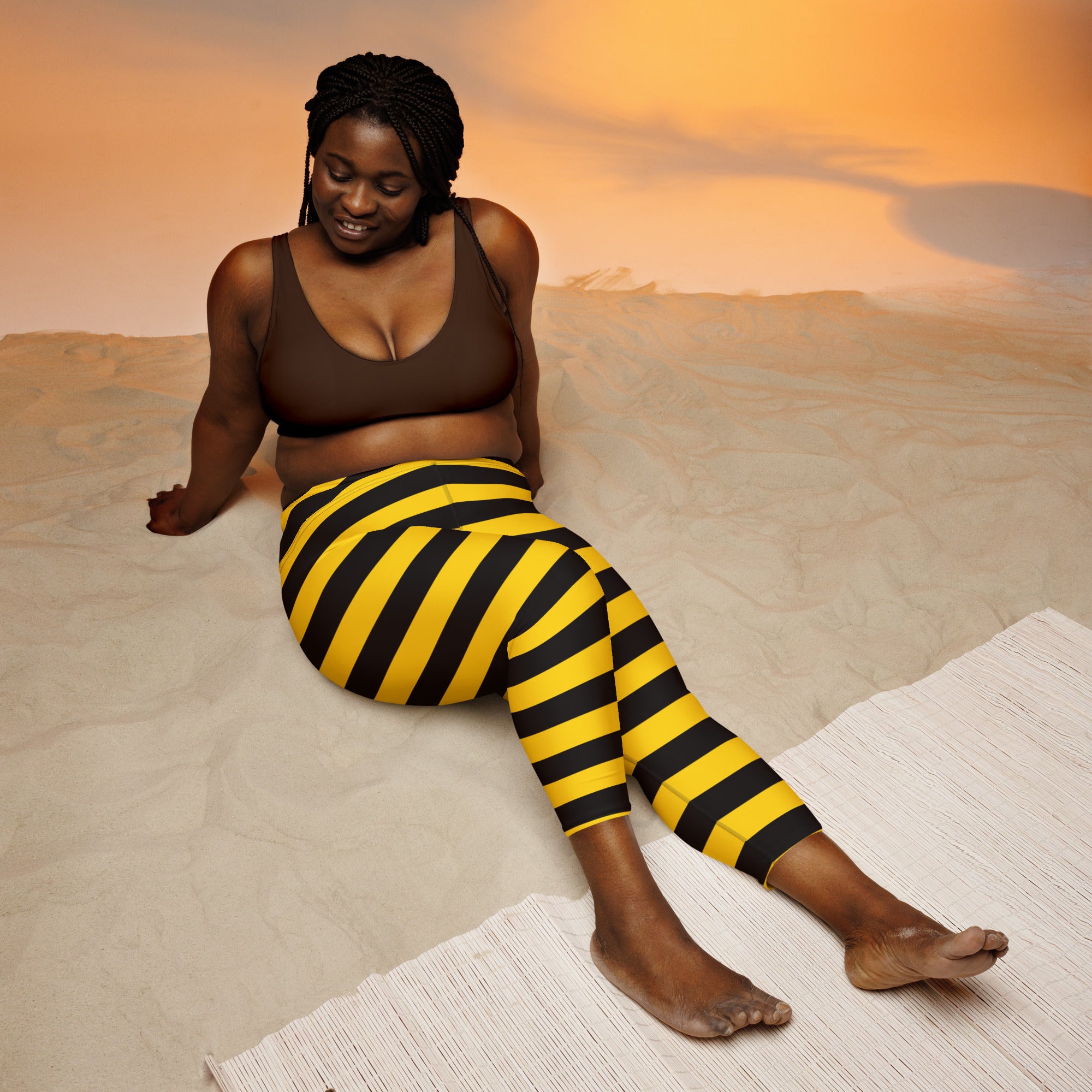 Women’s bumblebee stripe buttery soft yoga capri leggings in bold yellow and black with high-rise moisture-wicking design