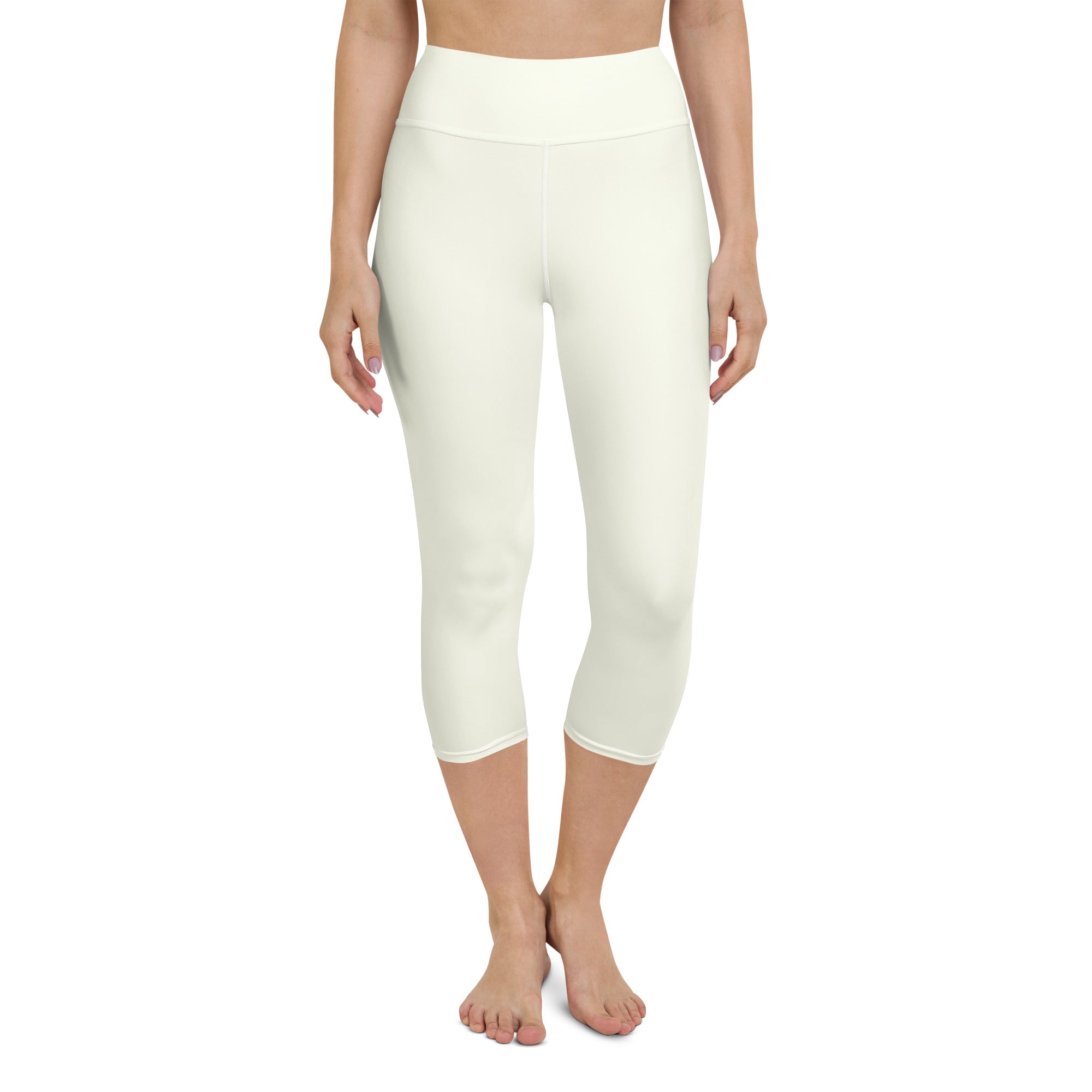 Women’s ivory buttery soft high-rise yoga capri leggings in cream color made of stretchy moisture-wicking fabric