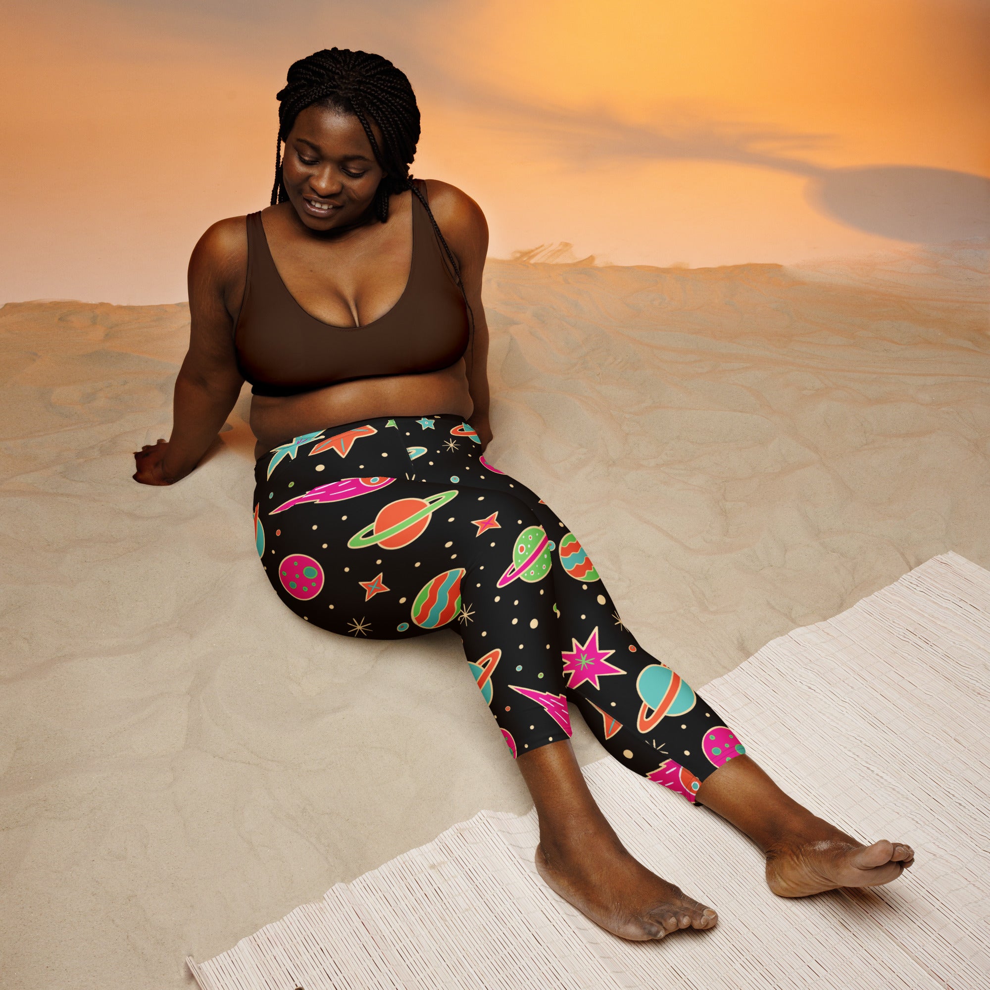 Women’s high-rise black leggings with vibrant colorful space print planets stars buttery soft moisture-wicking capris