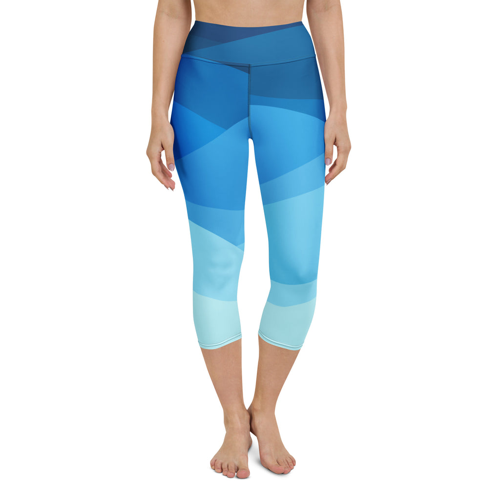 Blue gradient high-rise yoga capri leggings with buttery soft stretch fabric and moisture-wicking activewear design