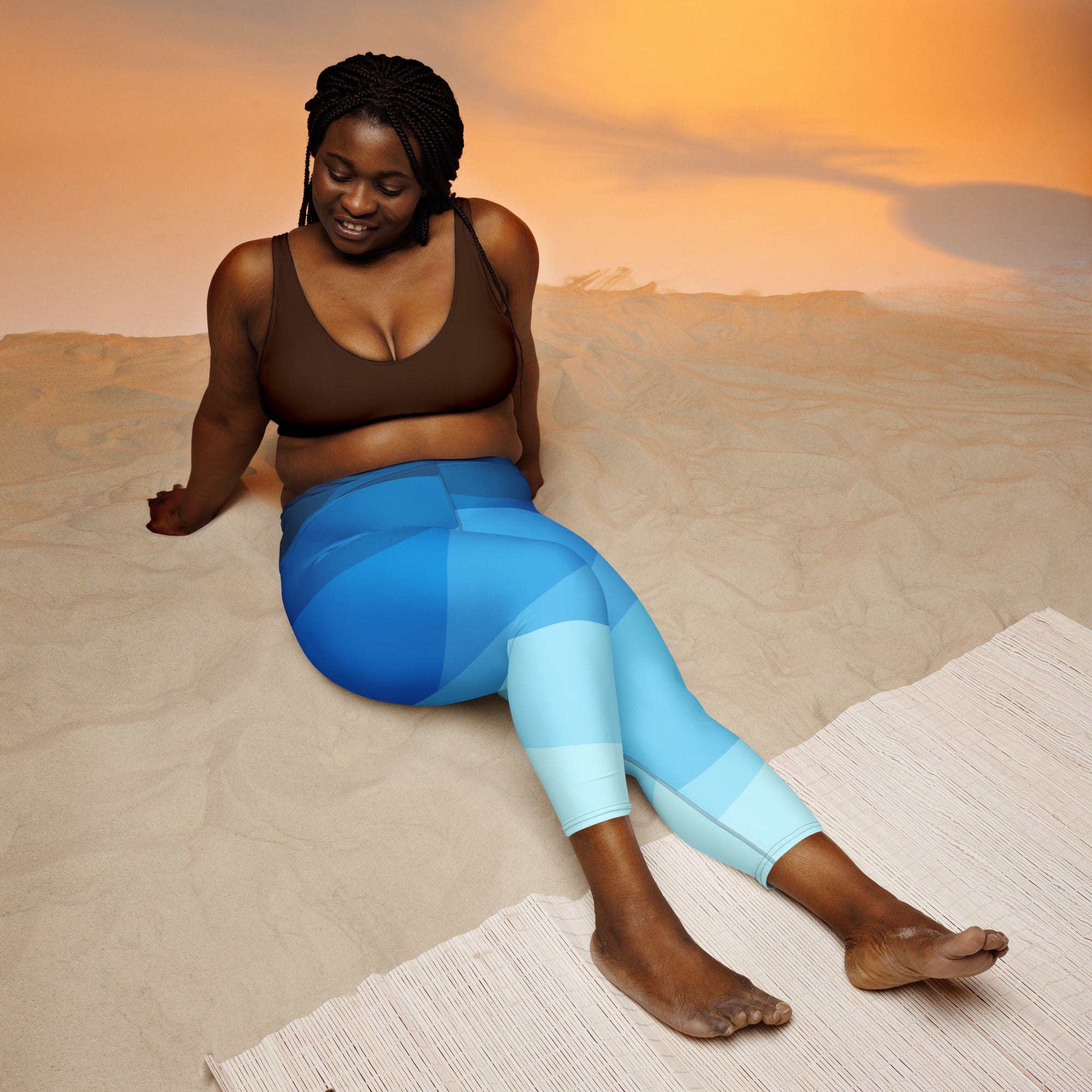 Women’s high-rise wavy blue buttery soft yoga capri leggings with geometric pattern moisture-wicking fabric