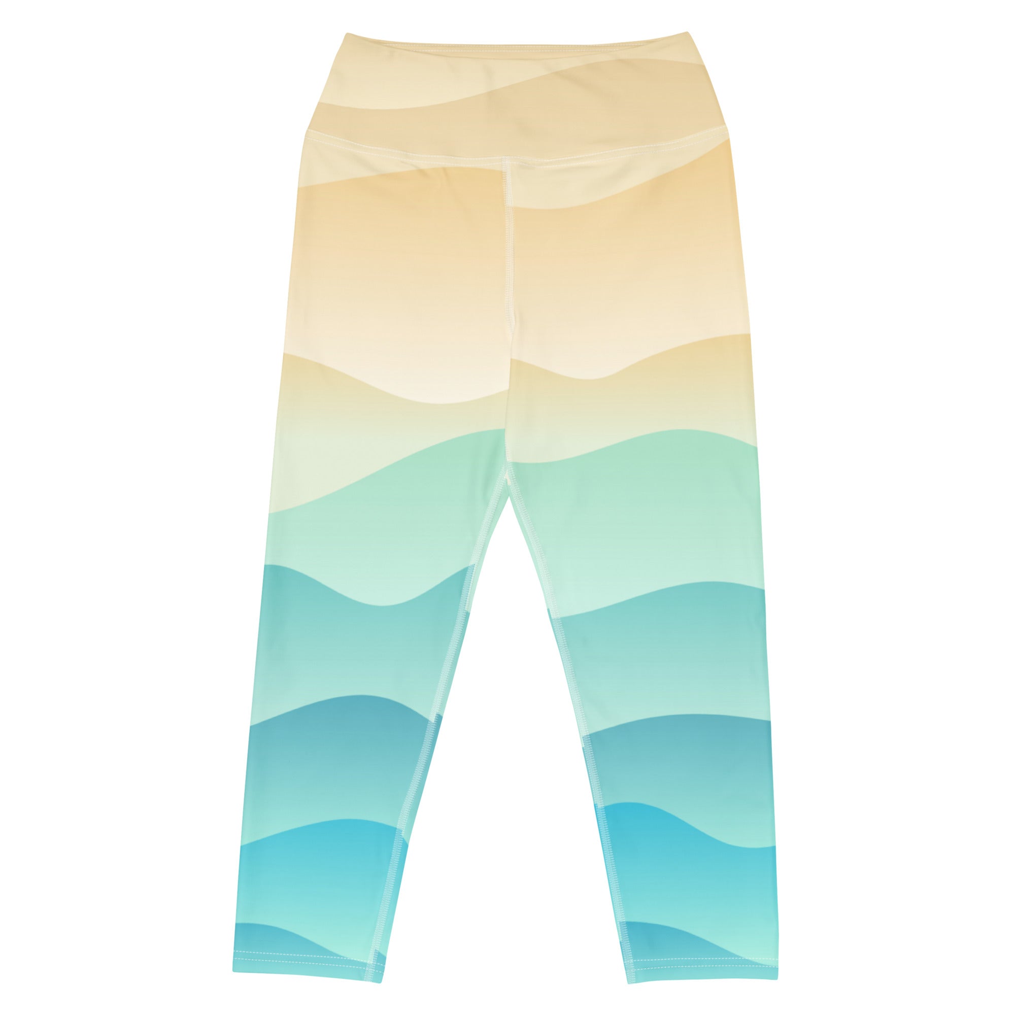 Women’s coastal gradient buttery soft yoga capri leggings with pastel peach to teal wave patterns and moisture-wicking fabric