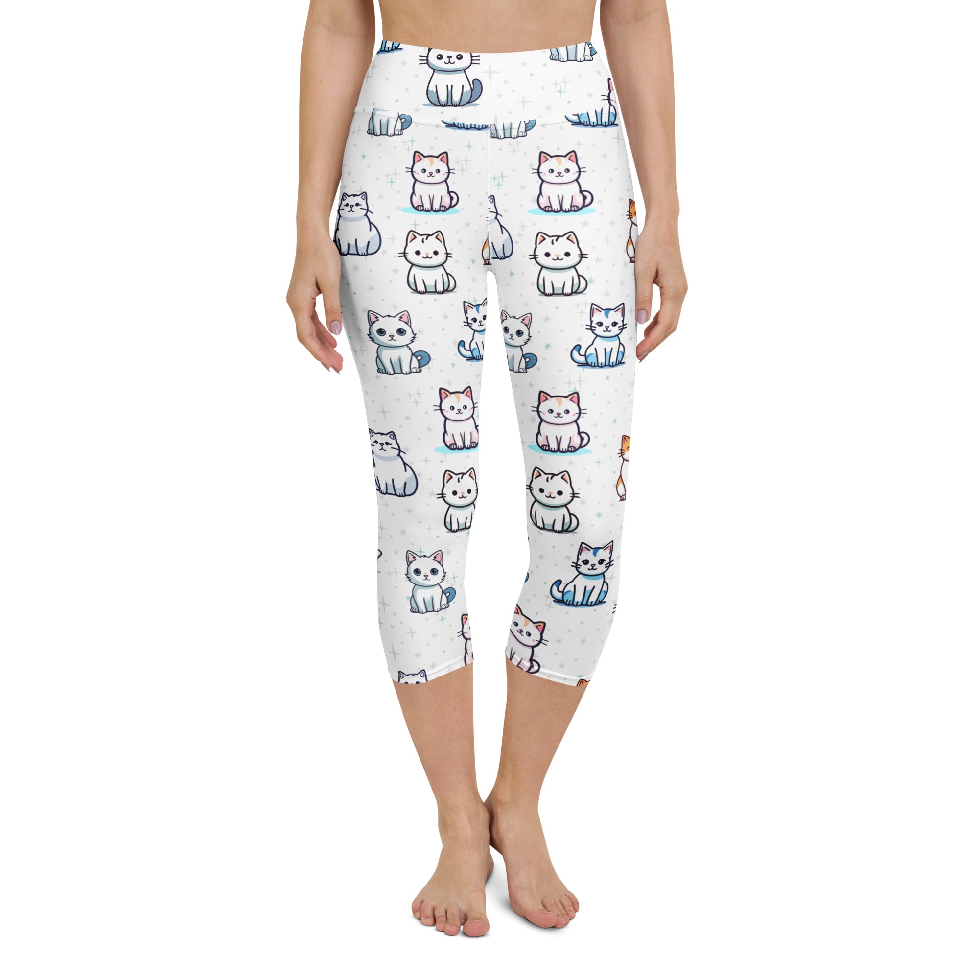 White capri leggings with a high-rise fit featuring pastel cartoon cat prints in buttery soft moisture-wicking fabric