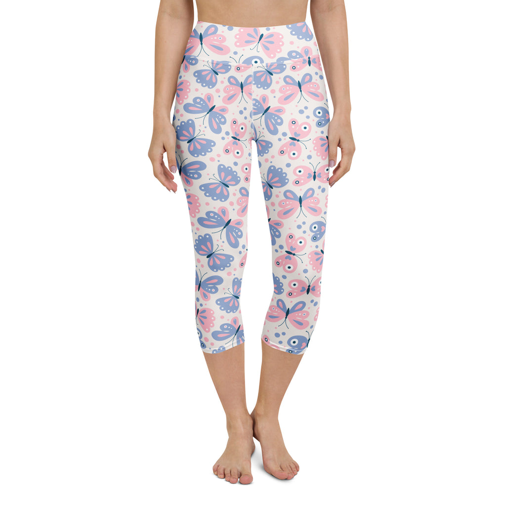Women’s high-rise pastel butterfly capri leggings with white base, buttery soft moisture-wicking stretch fabric