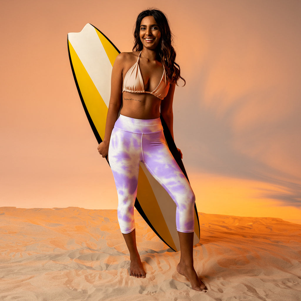 Women’s purple and white tie dye buttery soft high rise capri leggings with moisture wicking stretch fabric