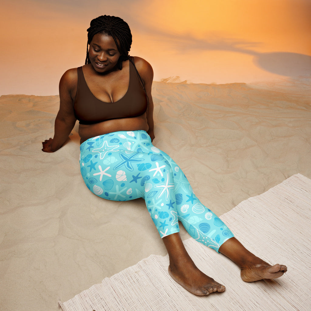 Women’s turquoise buttery soft yoga capri leggings with white starfish and seashell patterns high-rise moisture-wicking