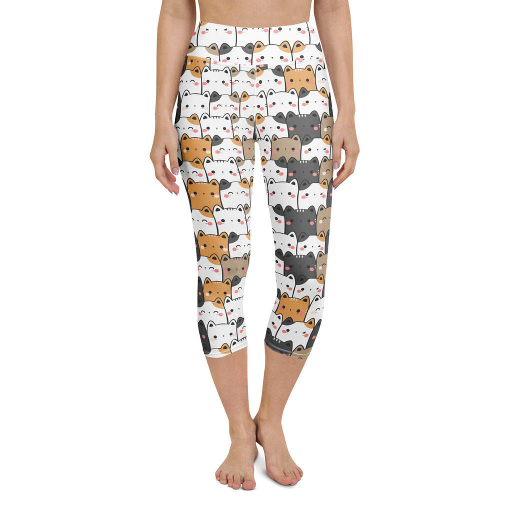White capri leggings with kawaii multicolor cartoon cats featuring high-rise, moisture-wicking soft stretch fabric