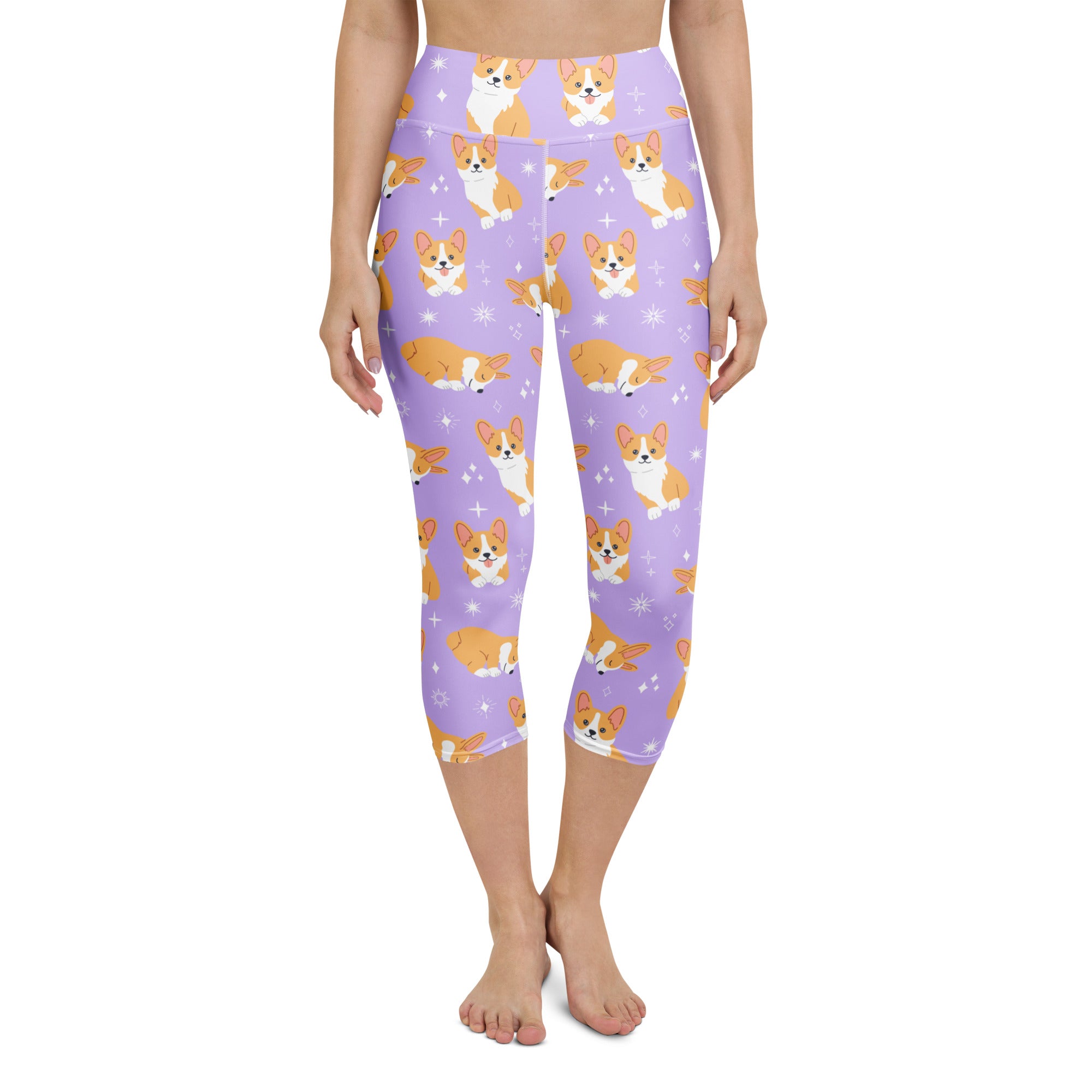 Women’s purple buttery soft high-rise capri leggings with orange and white corgi dog pattern and star accents