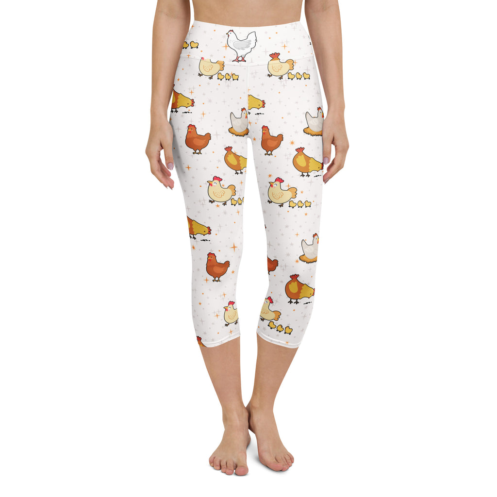 White capri leggings with playful yellow brown and white cartoon chickens and chicks buttery soft moisture-wicking fabric