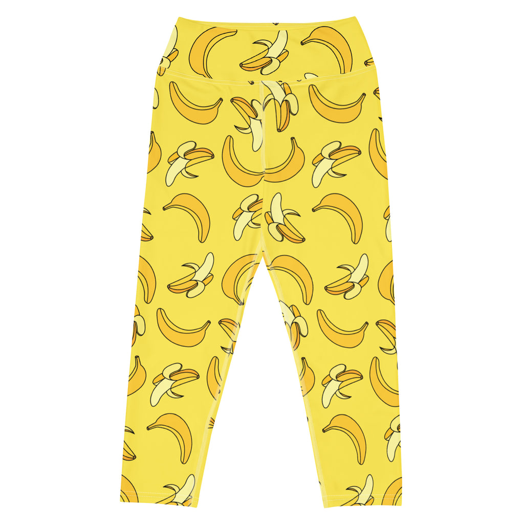 Women’s yellow buttery soft high-rise yoga capri leggings with playful cartoon banana pattern and moisture-wicking fabric