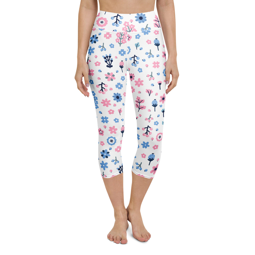 White capri leggings with pink and blue floral pattern featuring green stems high-rise moisture-wicking soft stretch