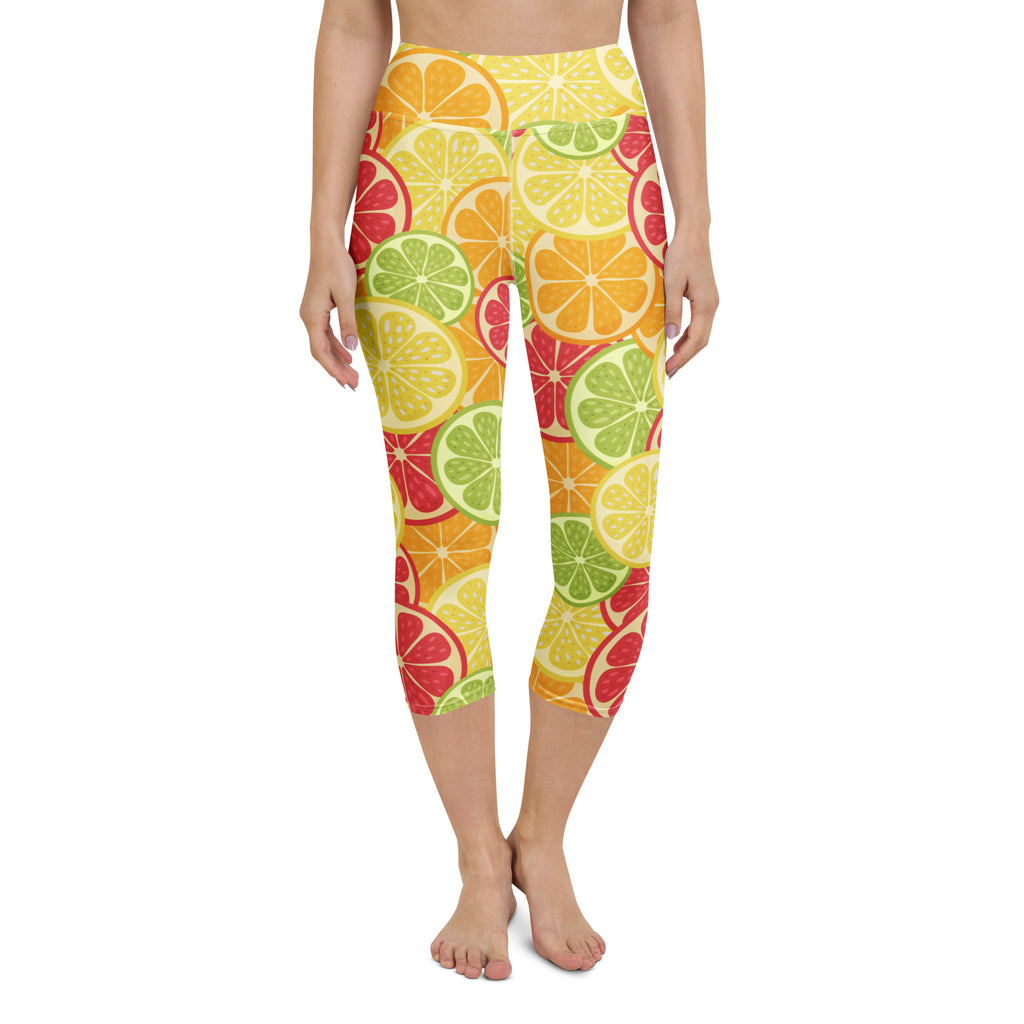 Women’s high-rise buttery soft yoga capri leggings with vibrant citrus fruit slice pattern in yellow green and red
