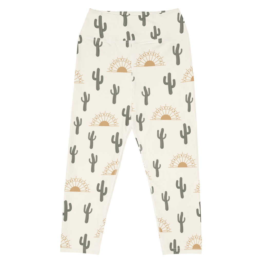 Women’s cream-colored buttery soft high-rise yoga capri leggings with gray cactus and tan sunset pattern