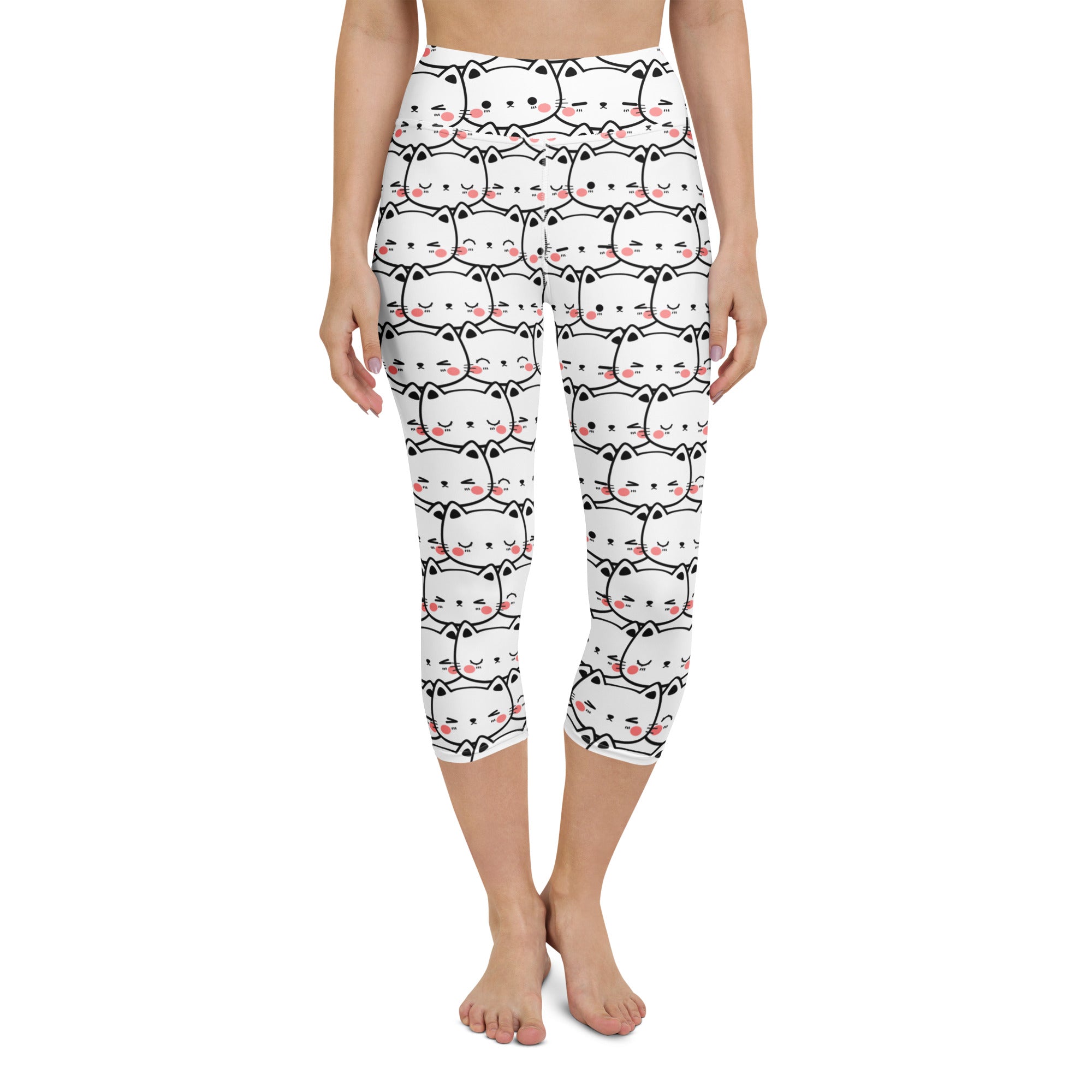 White high-rise capri leggings with black outlined cartoon cats and pink blush cheeks buttery soft moisture-wicking