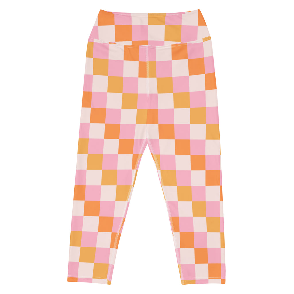 Women’s pink and orange checkerboard buttery soft high-rise yoga capri leggings with moisture-wicking stretch fabric