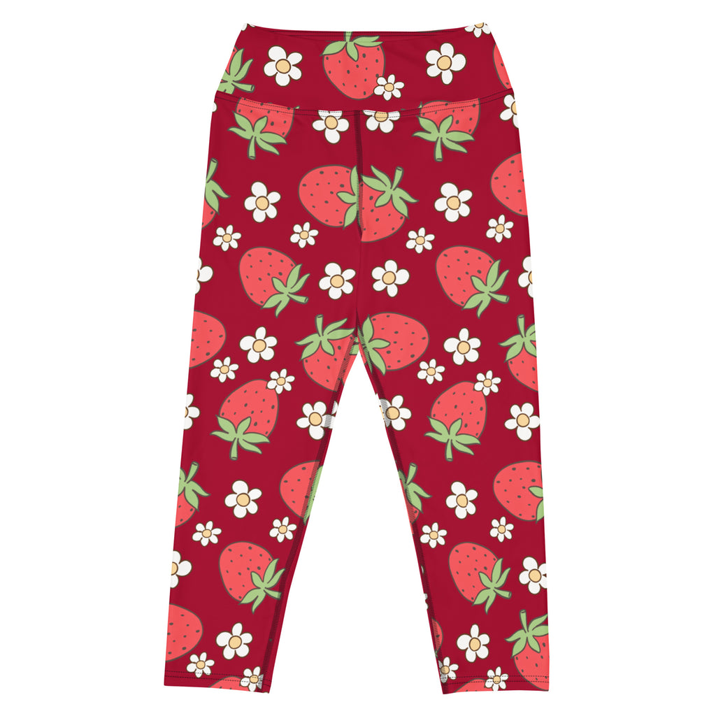 Women’s red high-rise buttery soft yoga capri leggings with playful strawberry and daisy pattern and moisture-wicking fabric