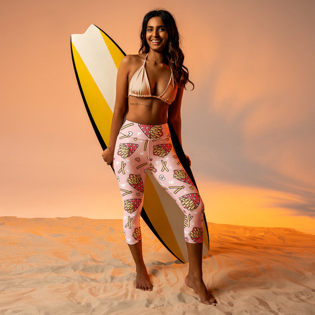 Women’s high-rise buttery soft pink yoga capri leggings with red and beige french fry heart print and moisture-wicking fabric